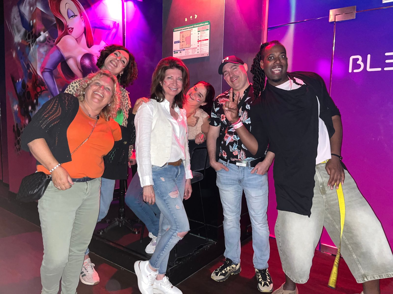 Group photo at an Amsterdam nightlife venue